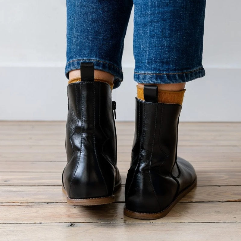 Person wearing Anya's Faye Boots - Black, rear view