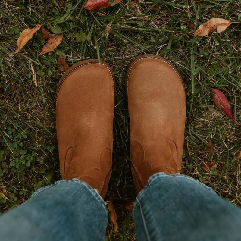 Person wearing Anya's Faye Boots - Cider, top view.