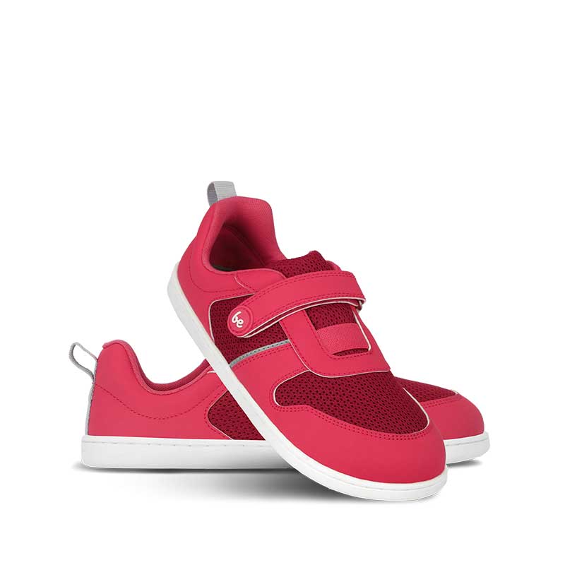Pair of Be Lenka Kids Trainers Glade - Dark Pink, one angled and leaning showing the outer side, the other partially showing the inner side