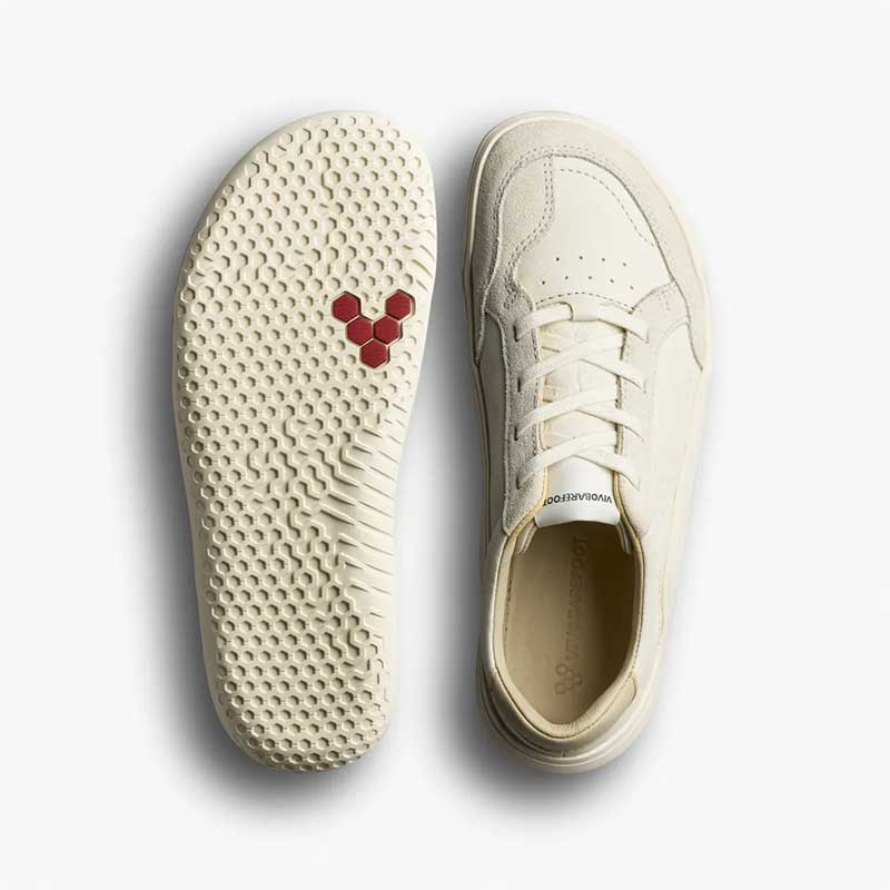 Pair of Vivobarefoot Junior Trainers Gobi - Limestone, one showing the sole view and the other showing the top view.
