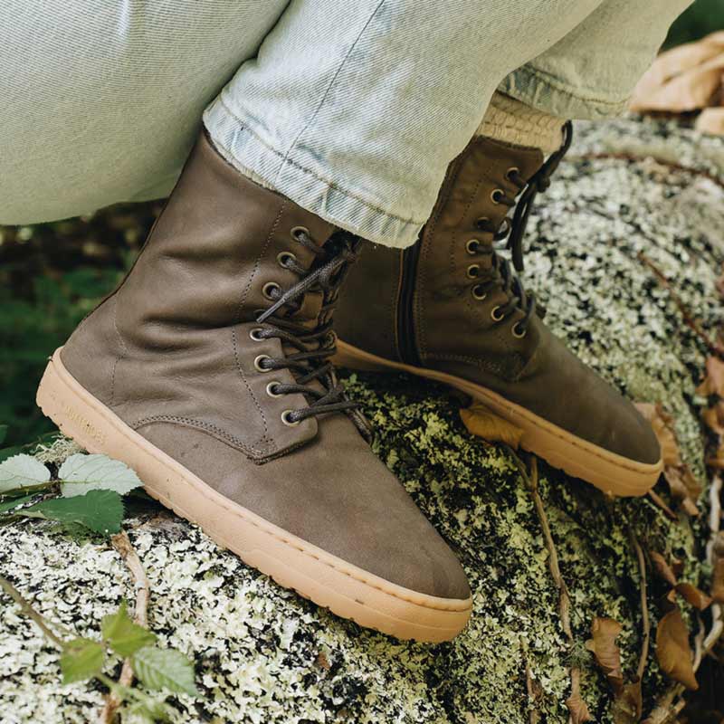 Person wearing Mukishoes Igneous Terra Boots - Brown.