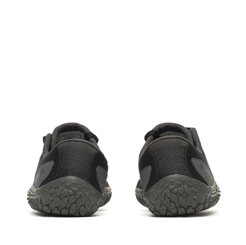 Pair of Merrell Women's Vapor Glove 7 Trainers - Black, rear view.