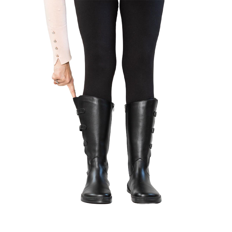 Person wearing Peerko Women's Boots Joana - Black, front view.