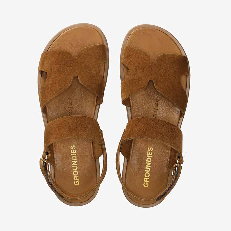 Pair of Groundies Adults Juno Sandals - Caramel, top view.