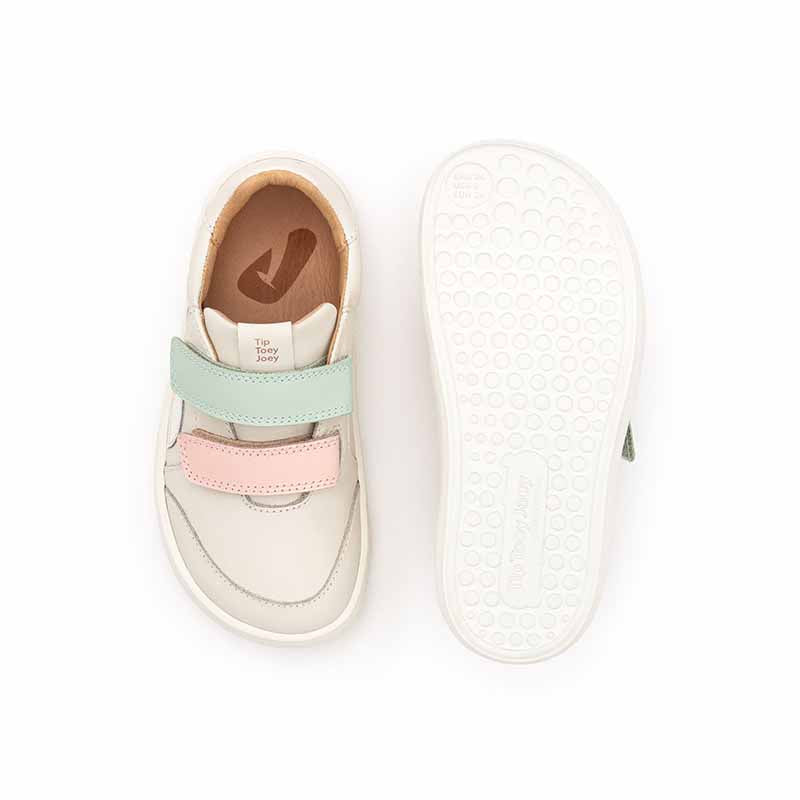 Pair of Tip Toey Joey Kids Trainers Landy - Mint and Pink, one showing the top view and the other showing the sole view.