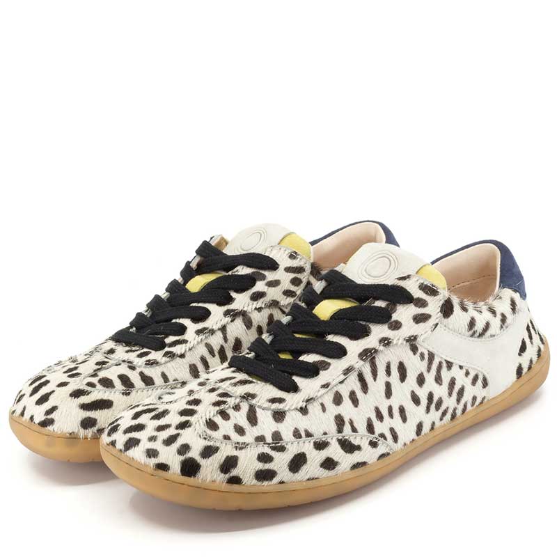 Pair of Mukishoes Trainers Lyra - Cruella, angled view showing outer side and front.