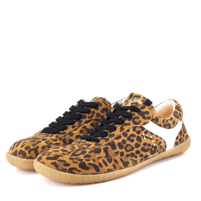 Pair of Mukishoes Trainers Lyra - Leo, angled view showing outer side and front.