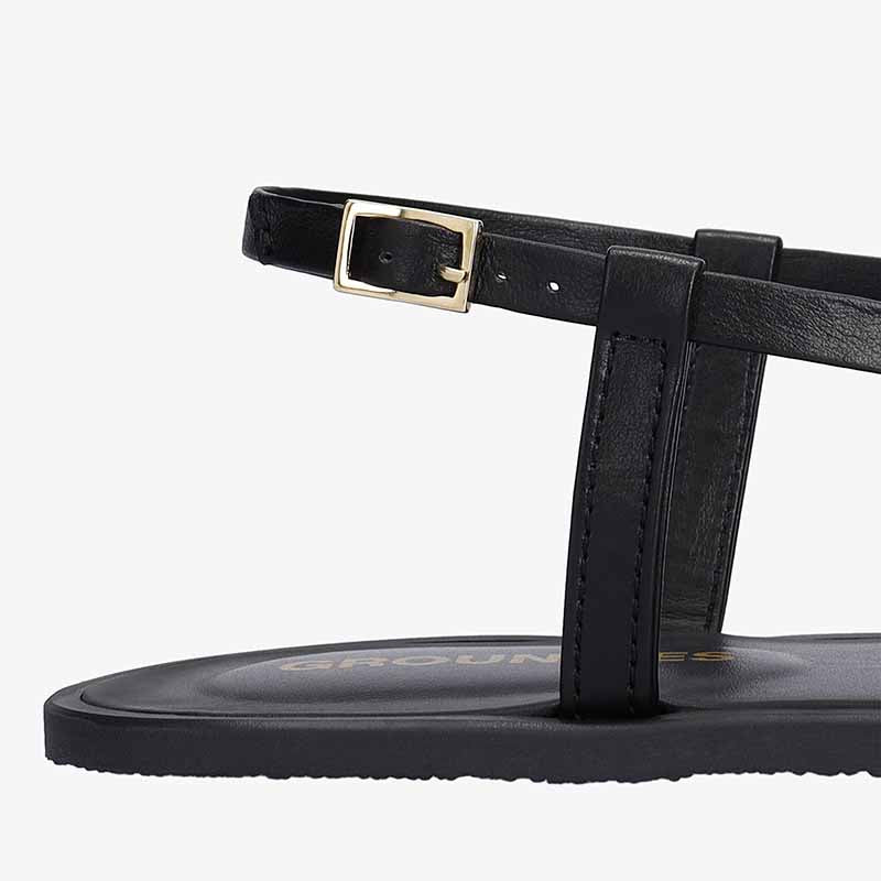 Groundies Adults Maya Sandal - Black, close up of heel strap.