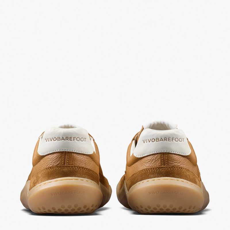 Pair of Vivobarefoot Men's Gobi II Leather Trainers - Tan, rear view.