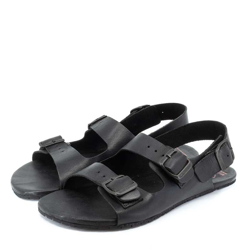Pair of Mukishoes Sandals Nazare - Black, angled view showing outer side and front.
