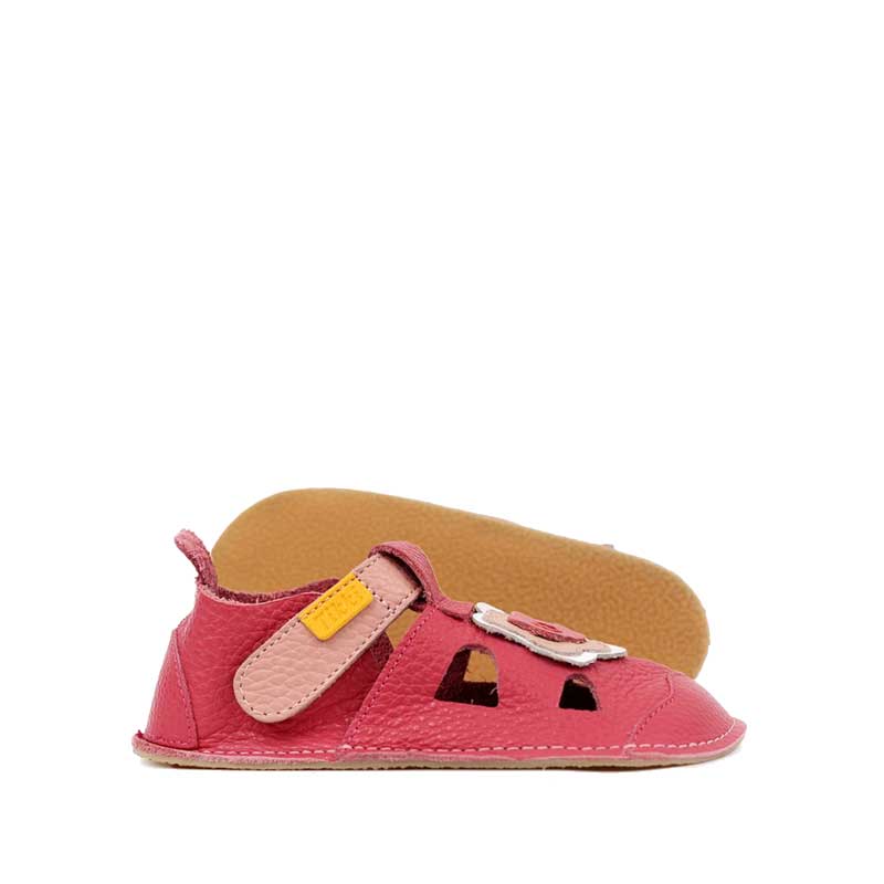 Pair of Tikki Kids Nido Sandals - Blossom, one showing the outer side and the other showing the sole view.