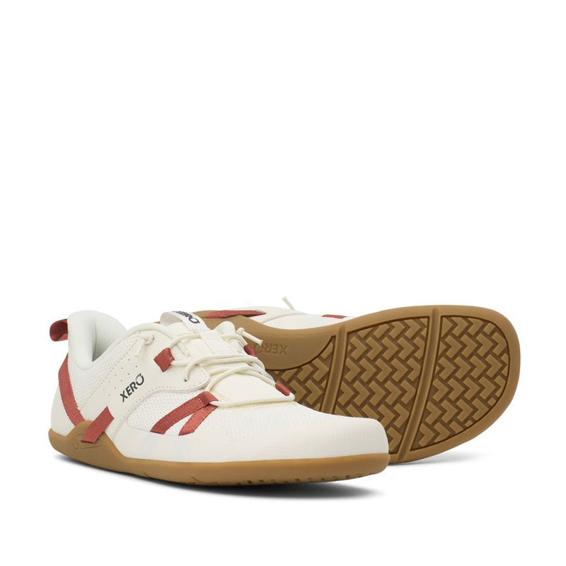 Pair of Xero Women's Athletic Shoes Prio Coast - Egret/Burnt Brick, one angled showing the outer side and front and the other showing the sole view.