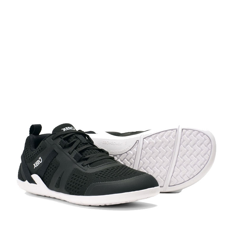 Pair of Xero Women's Athletic Shoes Prio Neo - Black and White, one angled showing the outer side and front and the other showing the sole view.
