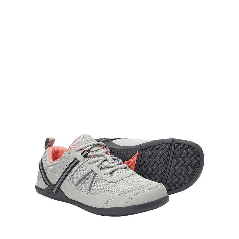 Pair of Xero Women's Athletic Shoes Prio - Lunar Rock, one angled showing the outer side and front view and the other, on its side slightly showing the sole view.