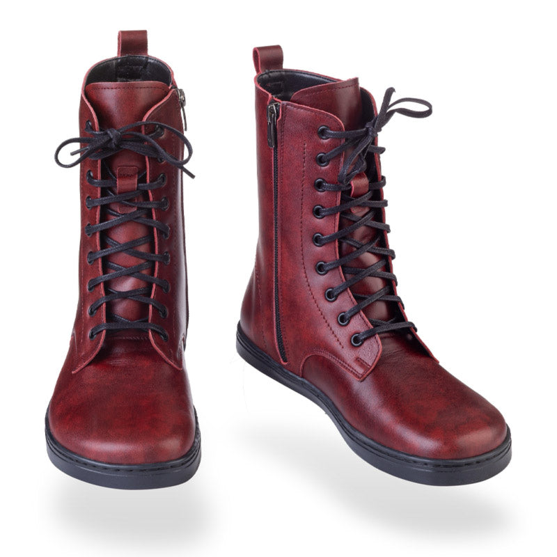 Pair of Peerko Adults Boots Pulse - Chilli, one showing the front view and the other slightly angled showing the inner side and front view.