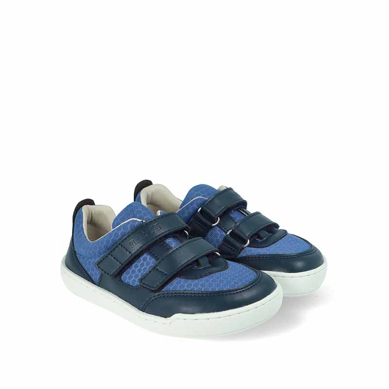 Pair of Rayve Kids Trainers Catbourne - Dark Blue, angled view showing outer side and front.
