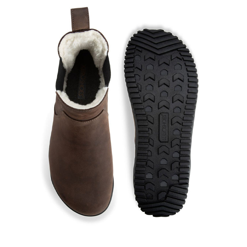 Pair of Xero Women's Lined Chelsea Boots Ridgeway - Brown, one showing the top view and the other showing the sole view.