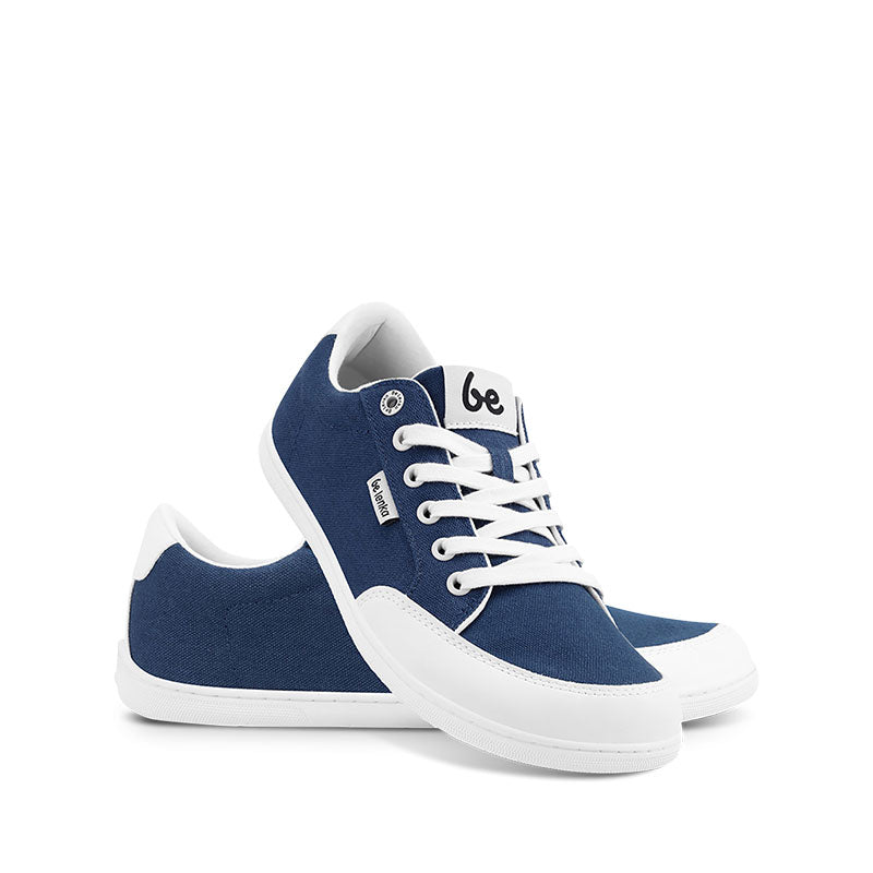Pair of Be Lenka Adults Trainers Rebound - Dark Blue and White, one angled and leaning showing the outer side, the other partially showing the inner side