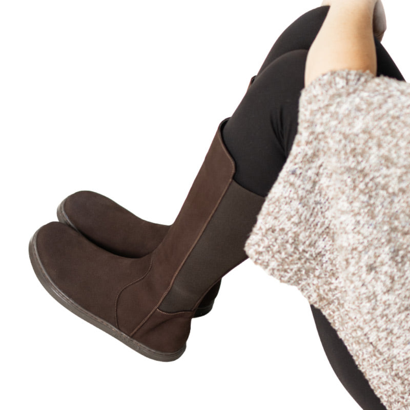 Person wearing Peerko Women's Regina II Boots - Brown (Narrower Calf) sitting down.