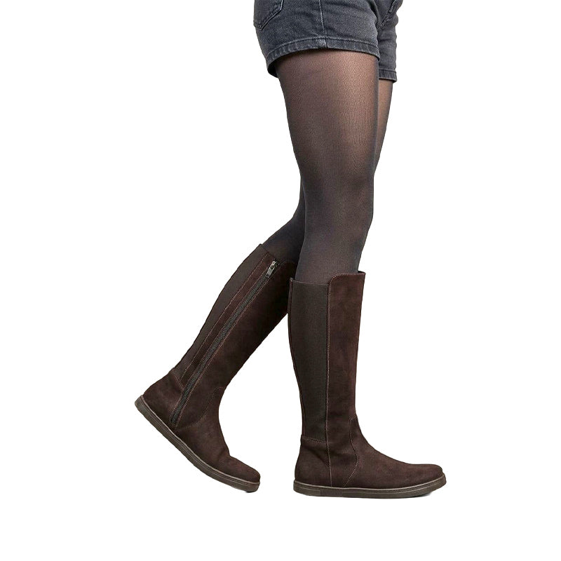 Person wearing Peerko Women's Regina II Boots - Brown, side view.