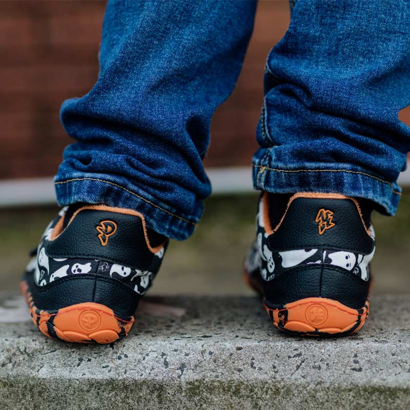 Child wearing PaperKrane Kids Lil Shoes - Spooky, rear view.