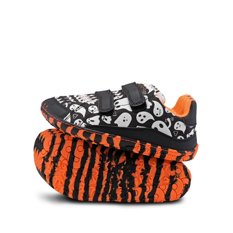 Pair of PaperKrane Kids Lil Shoes - Spooky, one balanced on top of the other. One showing the outer side view and the other showing the sole view.