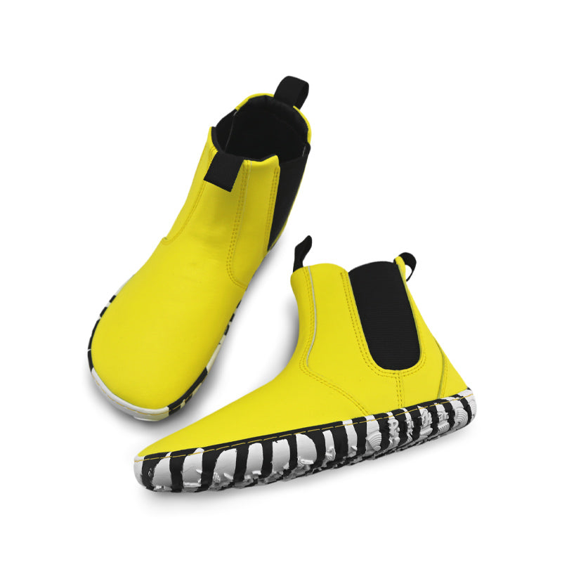 Pair of PaperKrane Kids Sunny Chelsea Boots - Yellow. One showing the top view and the other showing the side view.