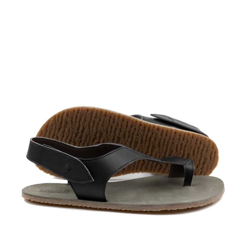 Pair of Tikki Women's Sandals Soul - Vegan Noir, one showing the outer side and the other showing the sole view.