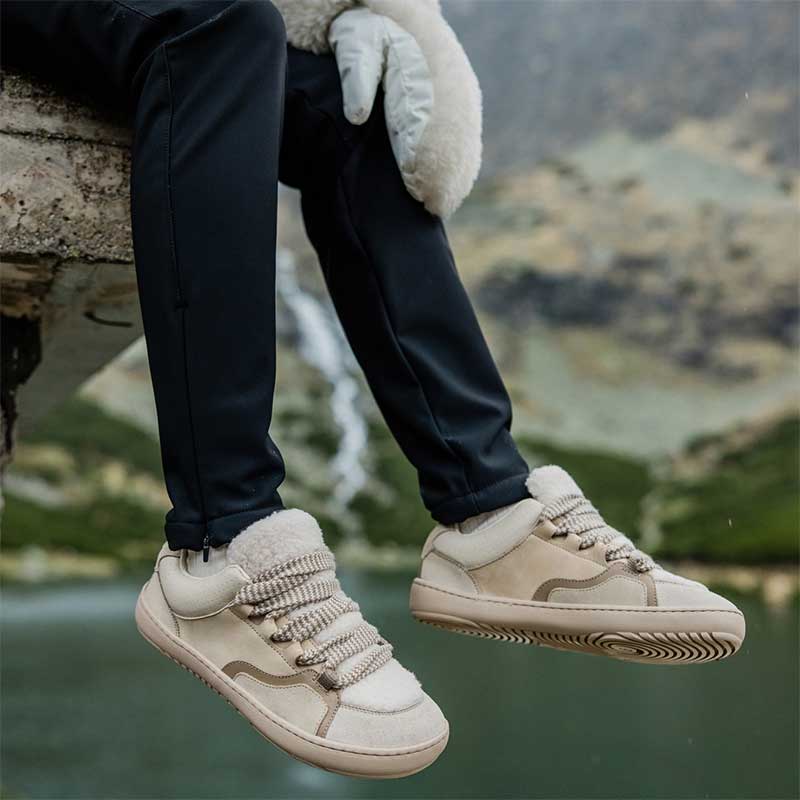 Person wearing Shapen Women's Teddy Trainers - Beige.