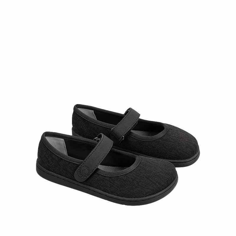 Pair of Be Lenka Kids Tinkee Ballet Shoes - All Black Sparkle, angled view showing outer side and front.