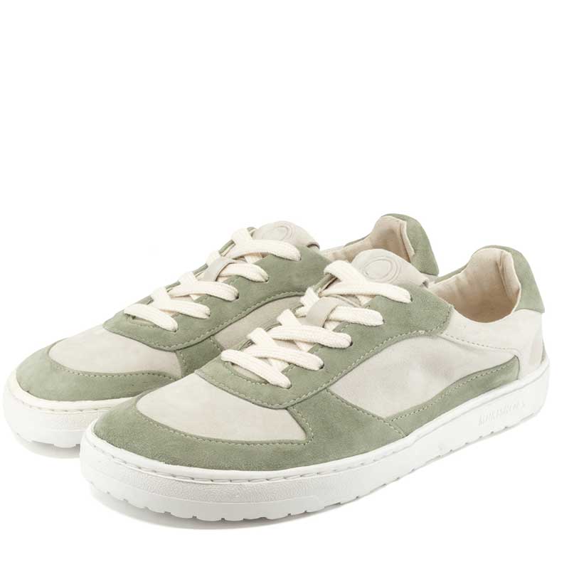 Pair of Mukishoes Trainers UNA - Pistachio, angled view showing outer side and front.