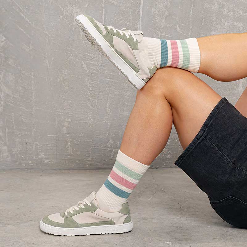 Person wearing Mukishoes Trainers UNA - Pistachio.