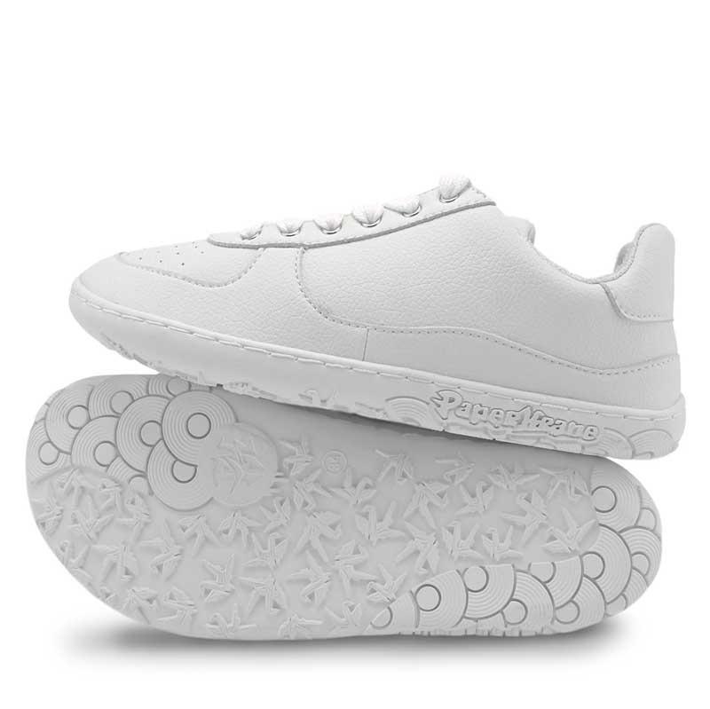 Pair of PaperKrane Vegan Shoes Low 2.0 in white, one showing outer side, the other on it's side showing the sole.