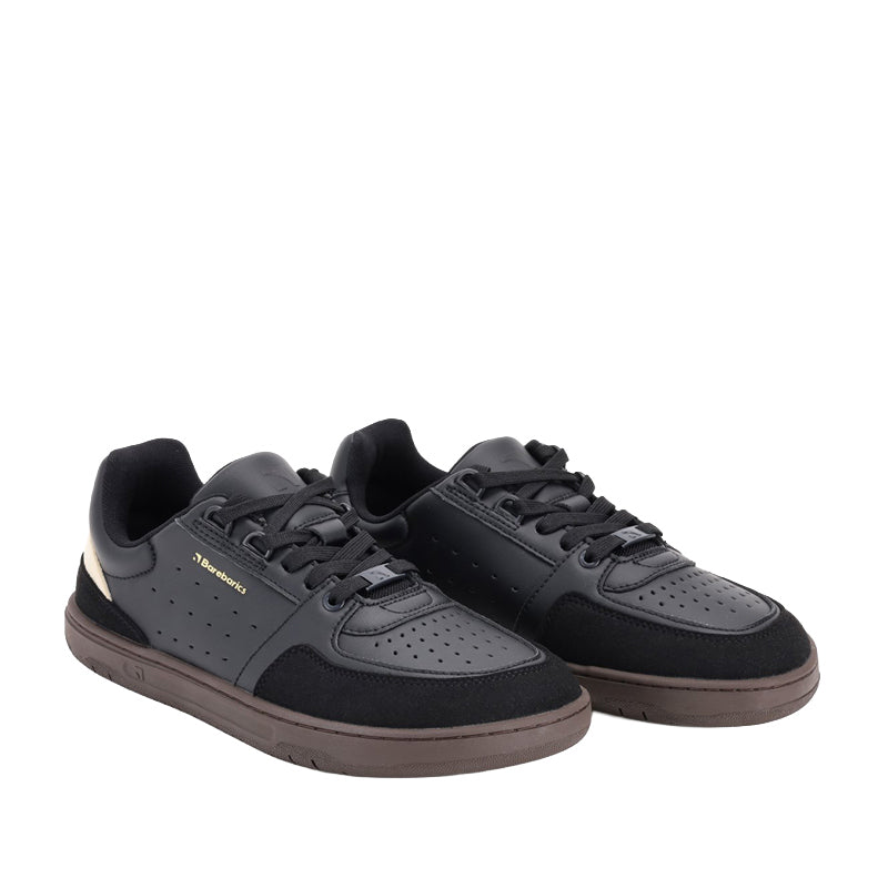 Pair of Be Lenka Adults Barebarics Trainers Wave 2.0 - Black and Dark Brown, angled view showing outer side and front.