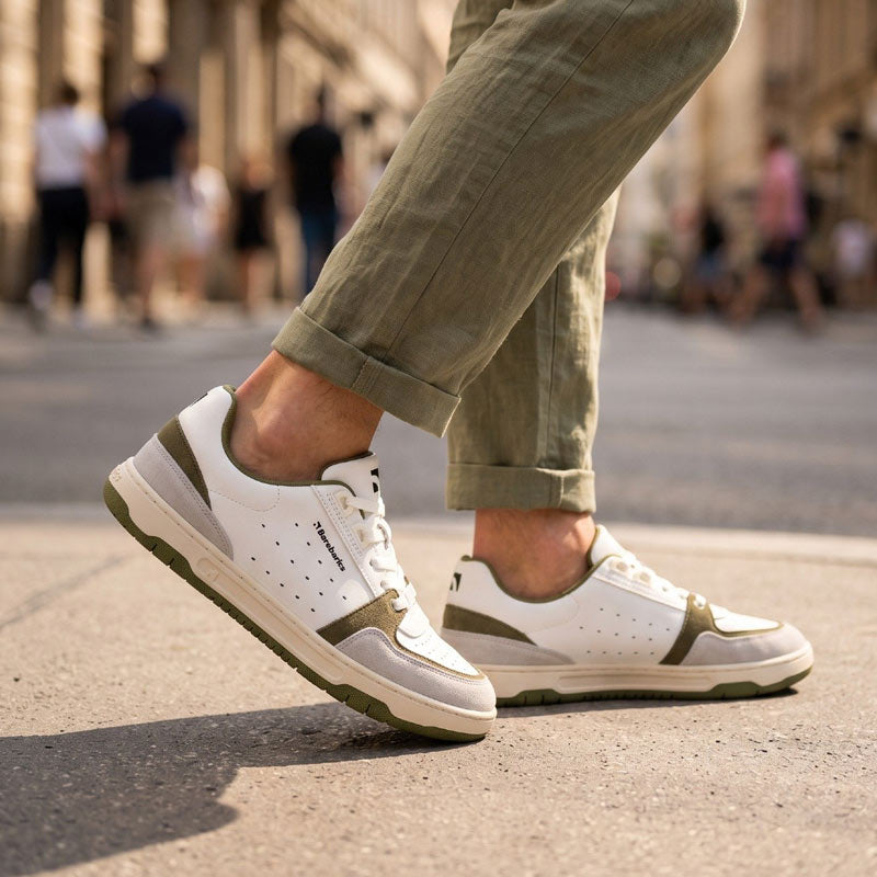 Person wearing Be Lenka Adults Barebarics Trainers Wave 2.0 - White and Green.