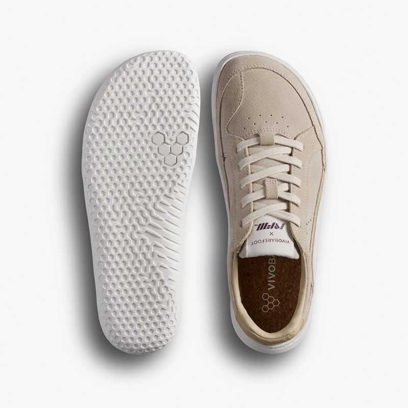 Pair of Vivobarefoot Women's Gobi II Leather Trainers - Sand and Fig, one showing the sole view and the other showing the top view.