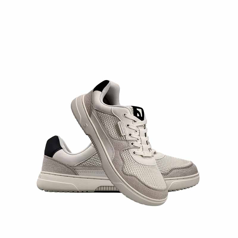 Pair of Be Lenka Adults Barebarics Vegan Trainers Zing Fresh - White and Beige, one leant against the other showing the outer side.