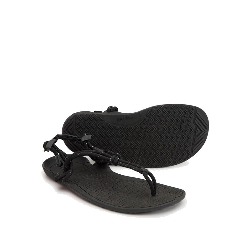 Pair of Xero Women's Sandals Aqua Cloud - Black, one angled showing the outer side and front and the other showing the sole view.