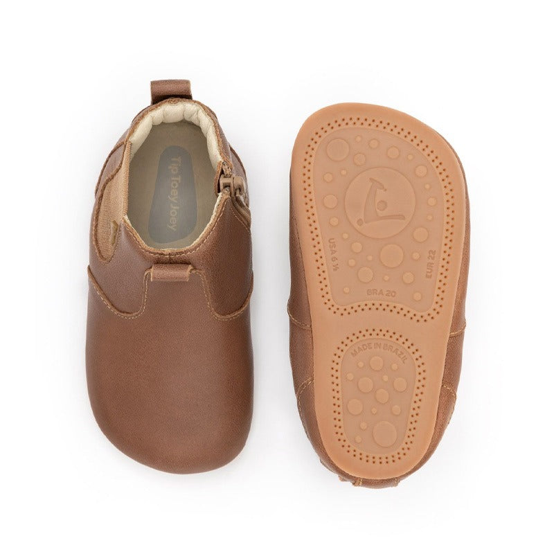 Pair of Tip Toey Joey Toddler Boots Dusty - Whisky, one showing the top view and the other showing the sole view.