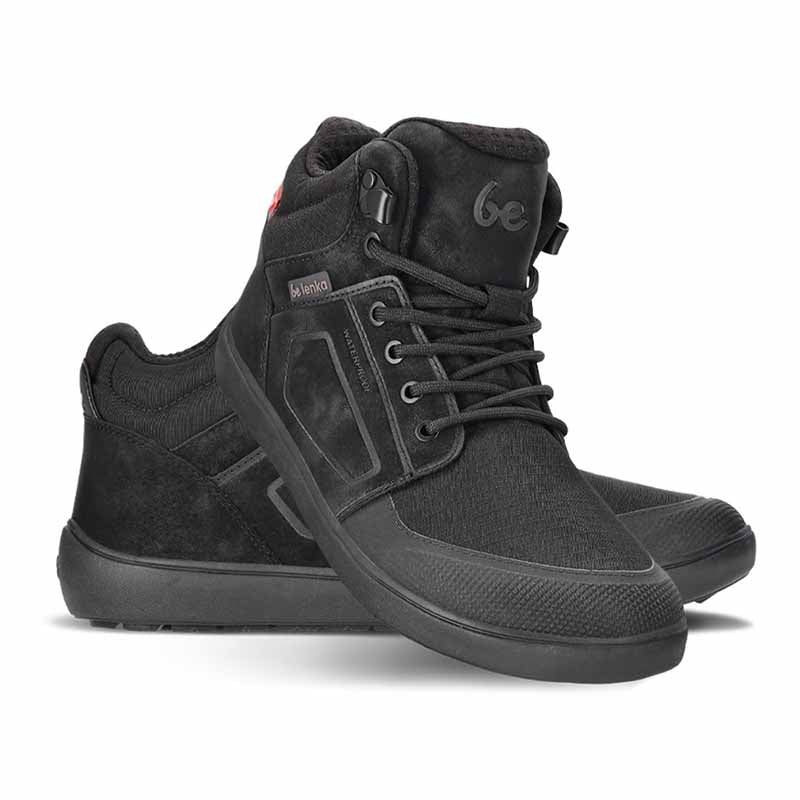 Pair of Be Lenka Adults Boots Arctic Edge - All Black, one angled and leaning showing the outer side, the other partially showing the inner side