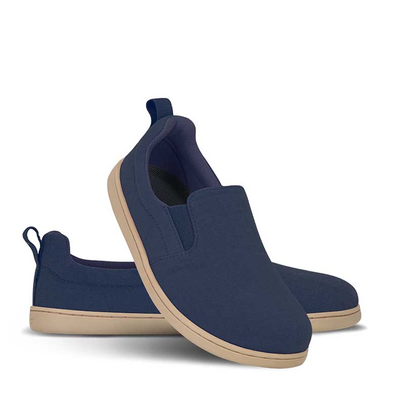 Pair of Be Lenka Kids Slip-On Shoes Aura - Navy, one angled and leaning showing the outer side, the other partially showing the inner side