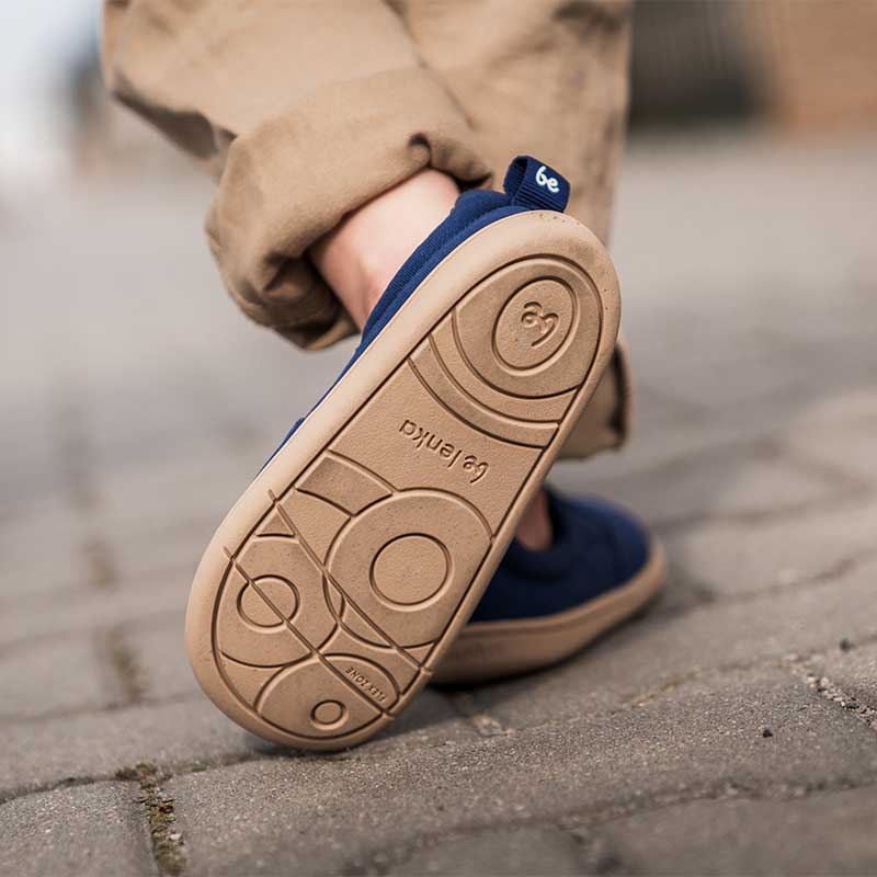Person wearing Be Lenka Kids Slip-On Shoes Aura - Navy, sole view