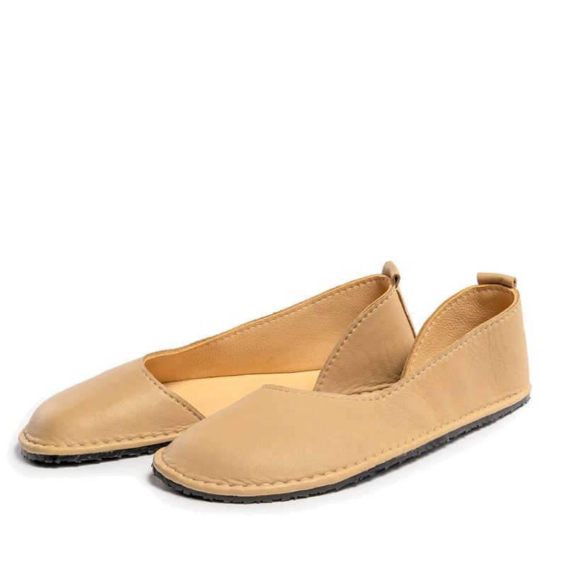 Pair of Luks Ballerina Shoes in beige, outer side and slight inner side view.