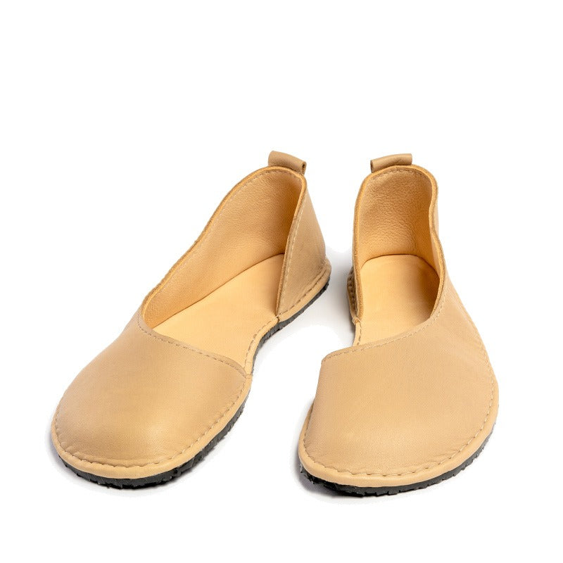 Pair of Luks Ballerina Shoes in beige, front and inner side view.