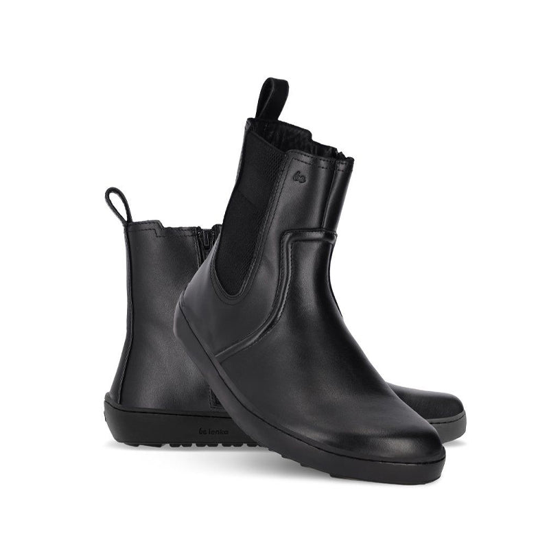 Pair of Be Lenka Adults Boots Allure - Black, one angled and leaning showing the outer side, the other partially showing the inner side