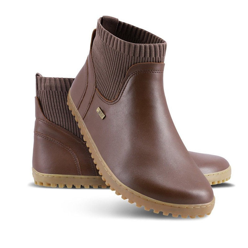 Pair of Be Lenka Adults Boots Mojo - Brown, one angled and leaning showing the outer side, the other partially showing the inner side