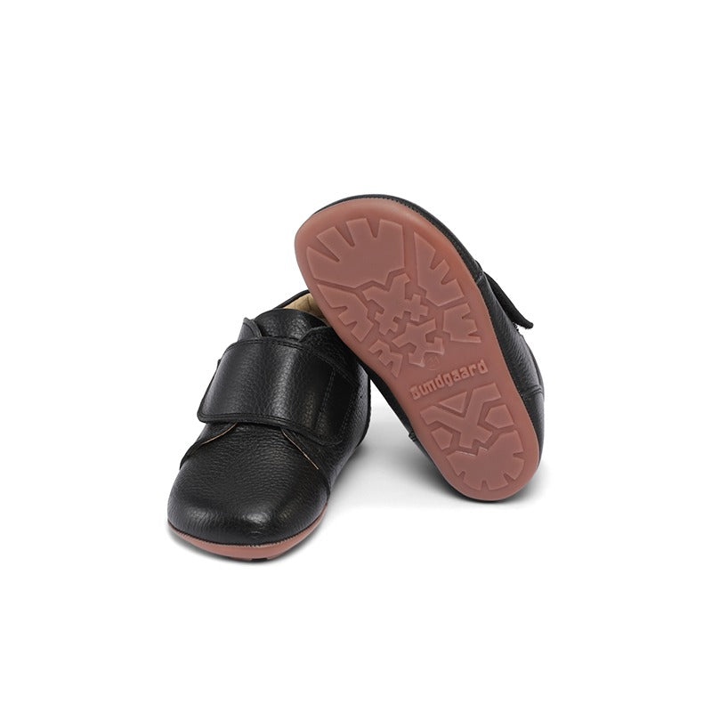 Pair of Bundgaard Kids Shoes Tannu - Black, one angled and one leaning showing front and sole view