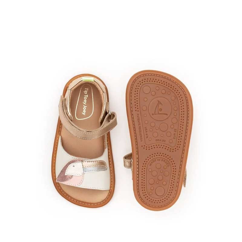Pair of Tip Toey Joey Toddler Sandals Toucan - Metallic Pink, one showing the top view and the other showing the sole view.