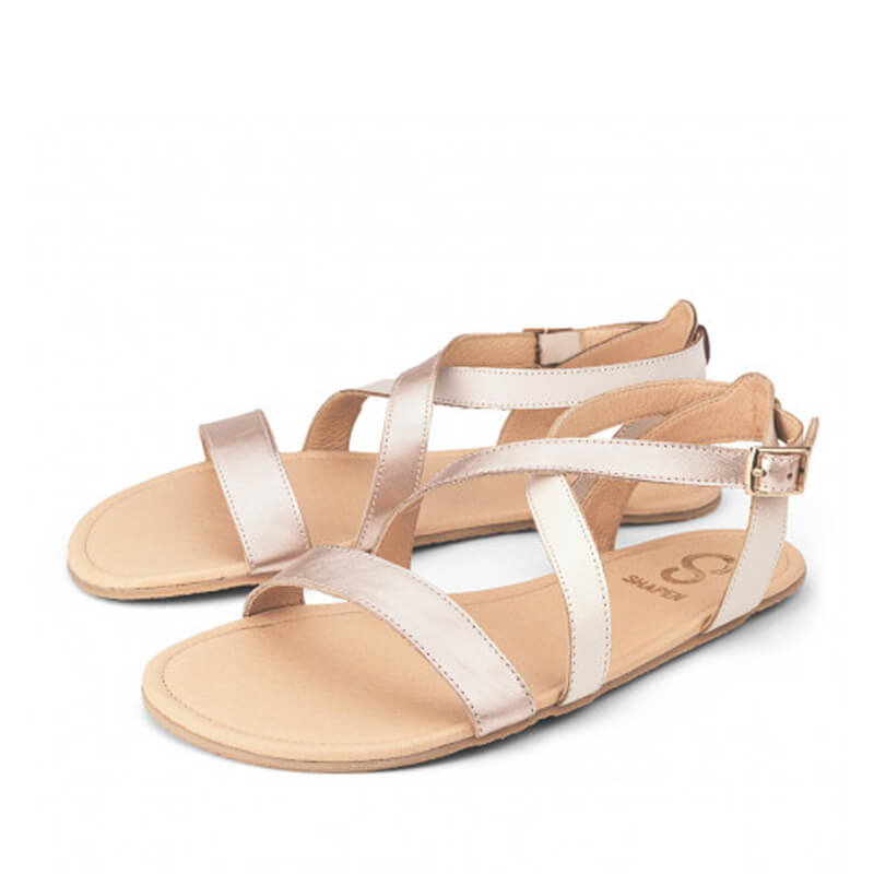 Pair of Shapen Women's Calla Sandals - Rose Gold, angled view showing outer side and front.