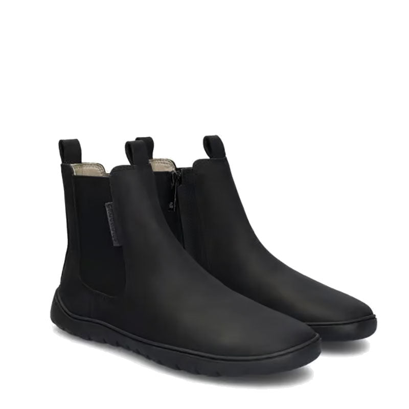 Pair of Groundies Women's Everyday Chelsea 2.0 Boots in black, angled view showing outer side and front.
